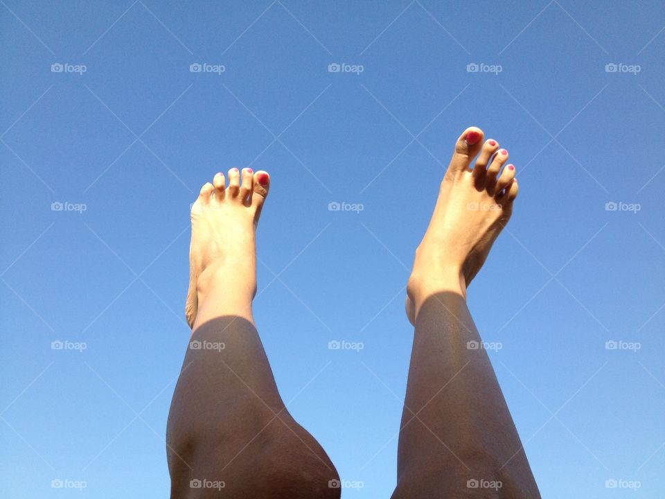 Foots in air. Foot in the sky