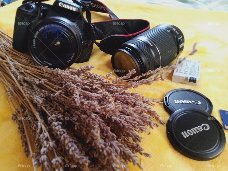 Camera in photography is a device for recording an image of an object on a light-sensitive surface, it is essentially a light-tight box with an aperture to admit light focused onto a sensitized film or plate.