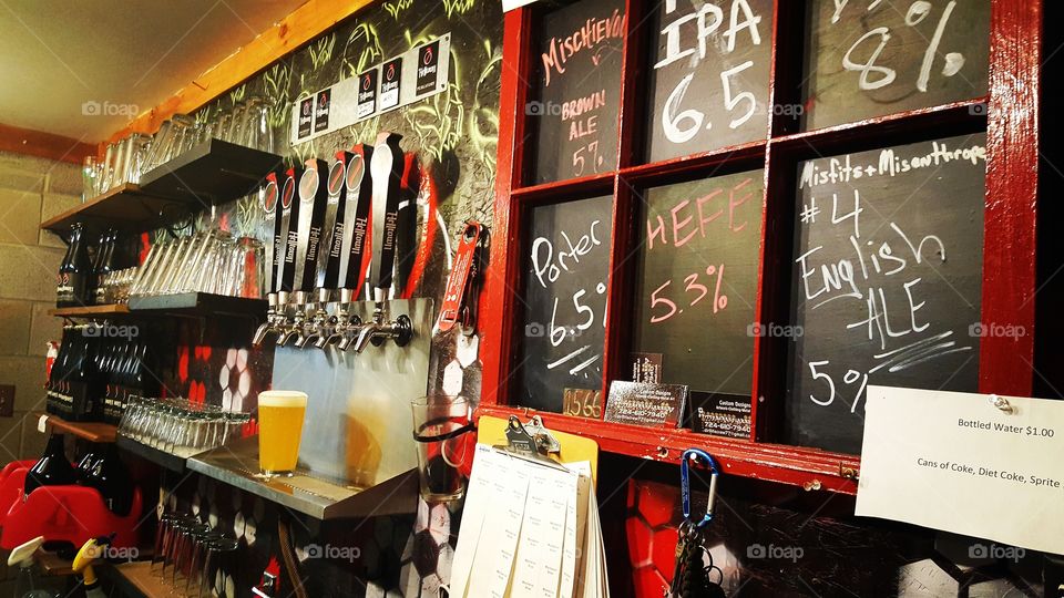 Micro Brewery selling beer by the glass or growler has a colorful and fun atmosphere.