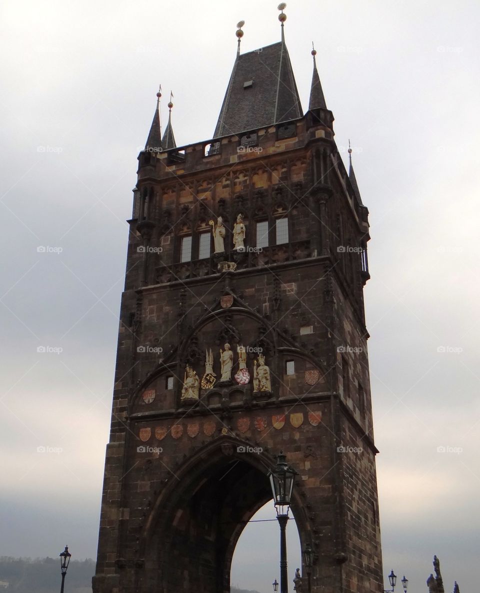 One day in Prague Charles bridge tower