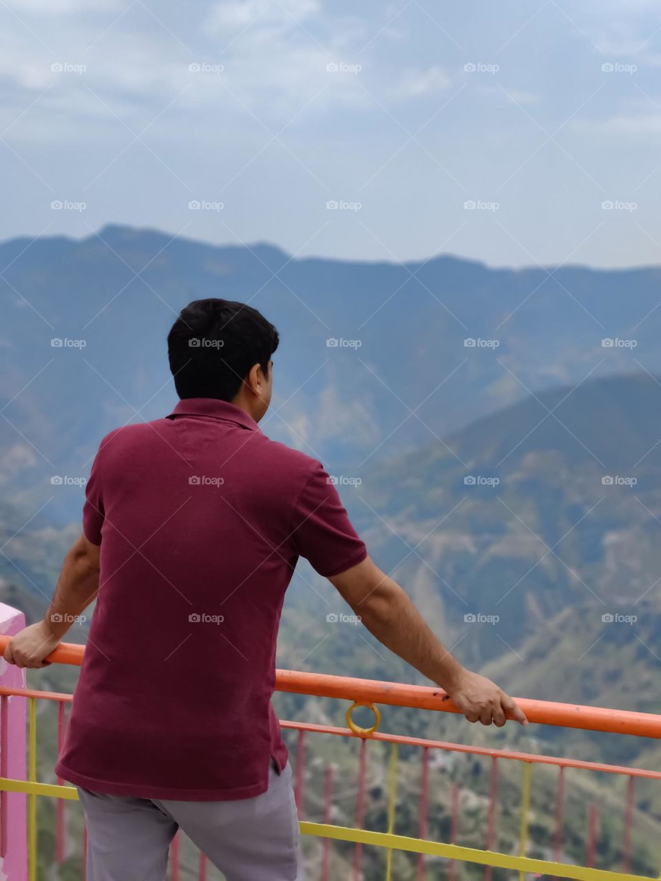 A man admiring the mountains