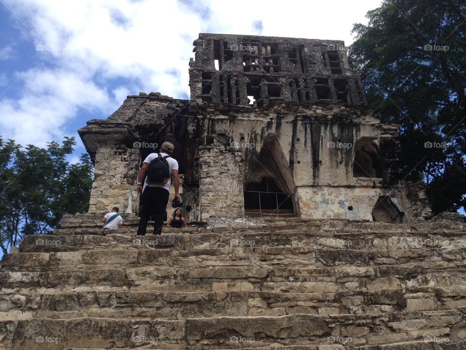 Exploring the prehispanic stone ruins in Palenque, a magical arqueological site in the middle of the jungle of Chiapas in Mexico