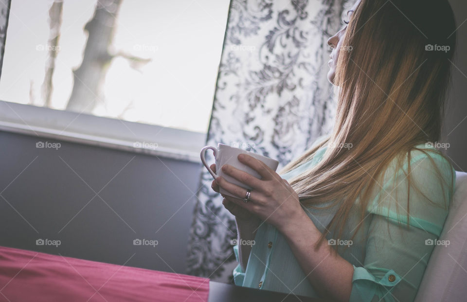 The girl with her morning coffee