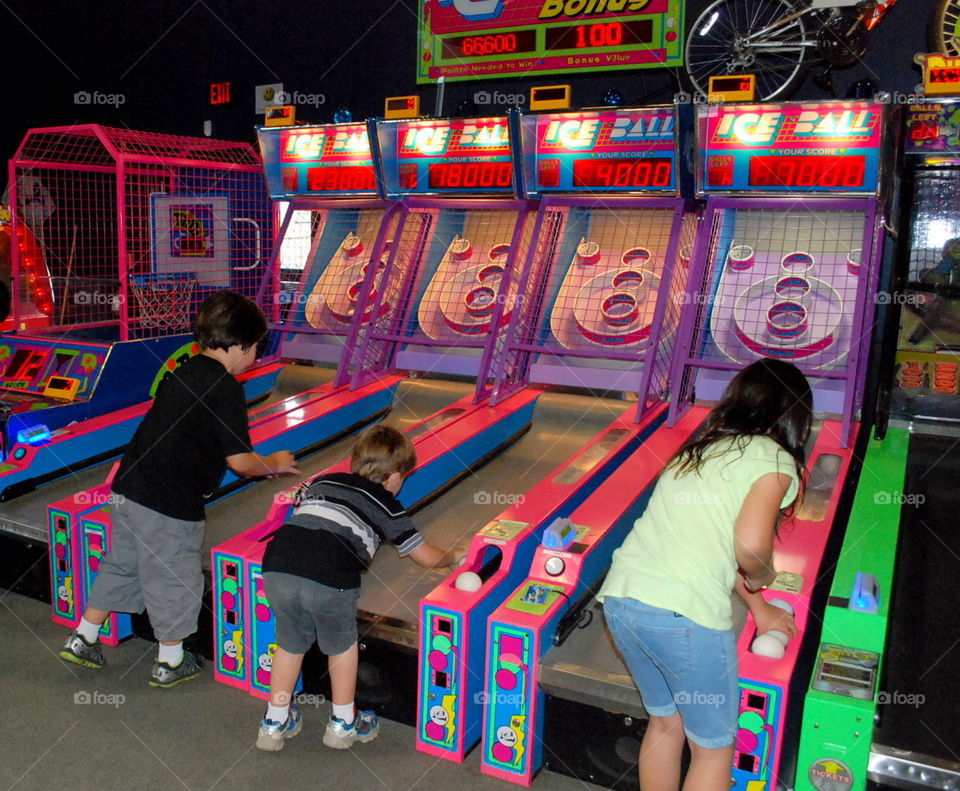 playing arcade games