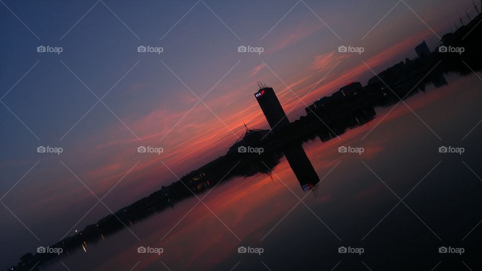 A beautiful sunset over city panorama with river in Riga, Latvia