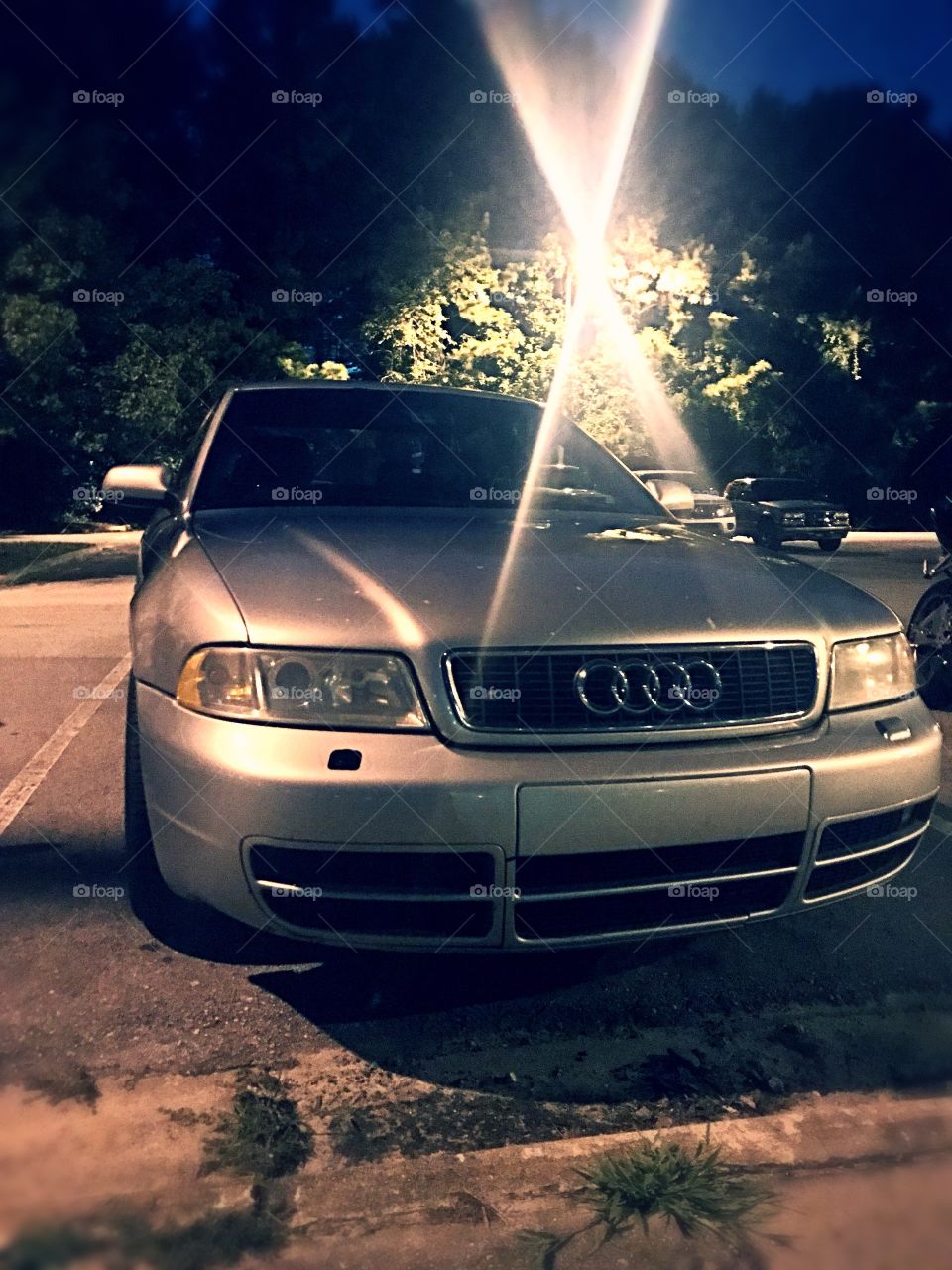 2001 Audi S4 2.6t AWD 6MT nighttime shoot of front end headlights, bumper, hood, grille, backlit photo