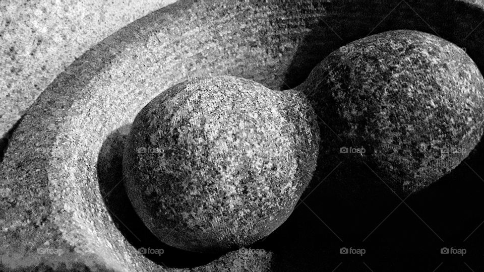 close up of stone mortar and pestle