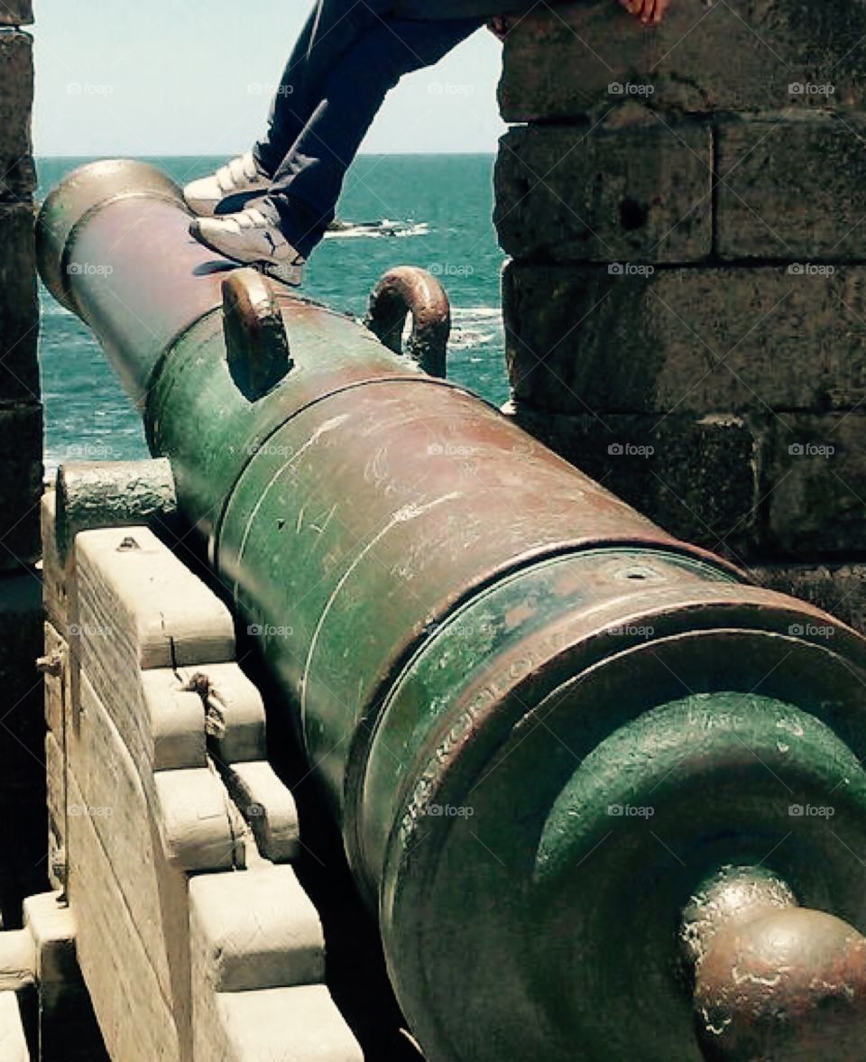 Old cannon overlooking the sea