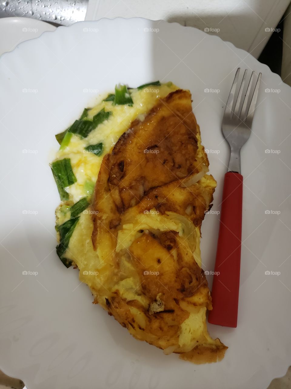 Omelete saudável feito por mim... caprichei no curry, salsa e cebolinha...
