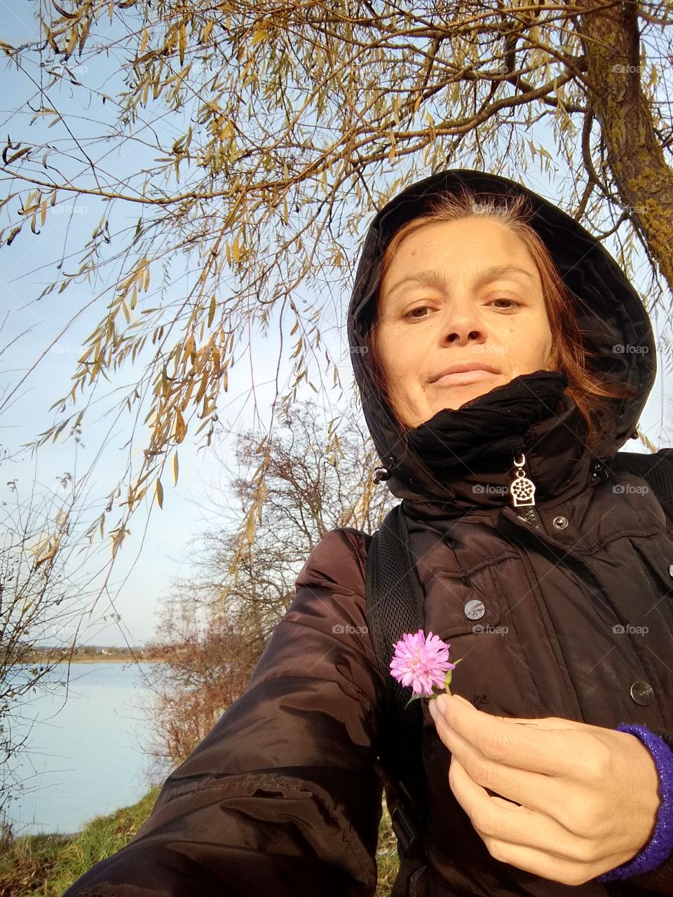 selfie girl on the nature with flower autumn time