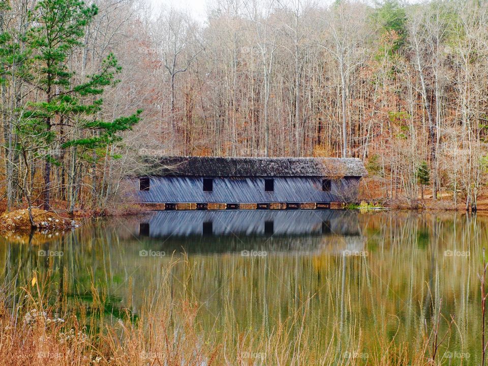Hut reflecting on the lake