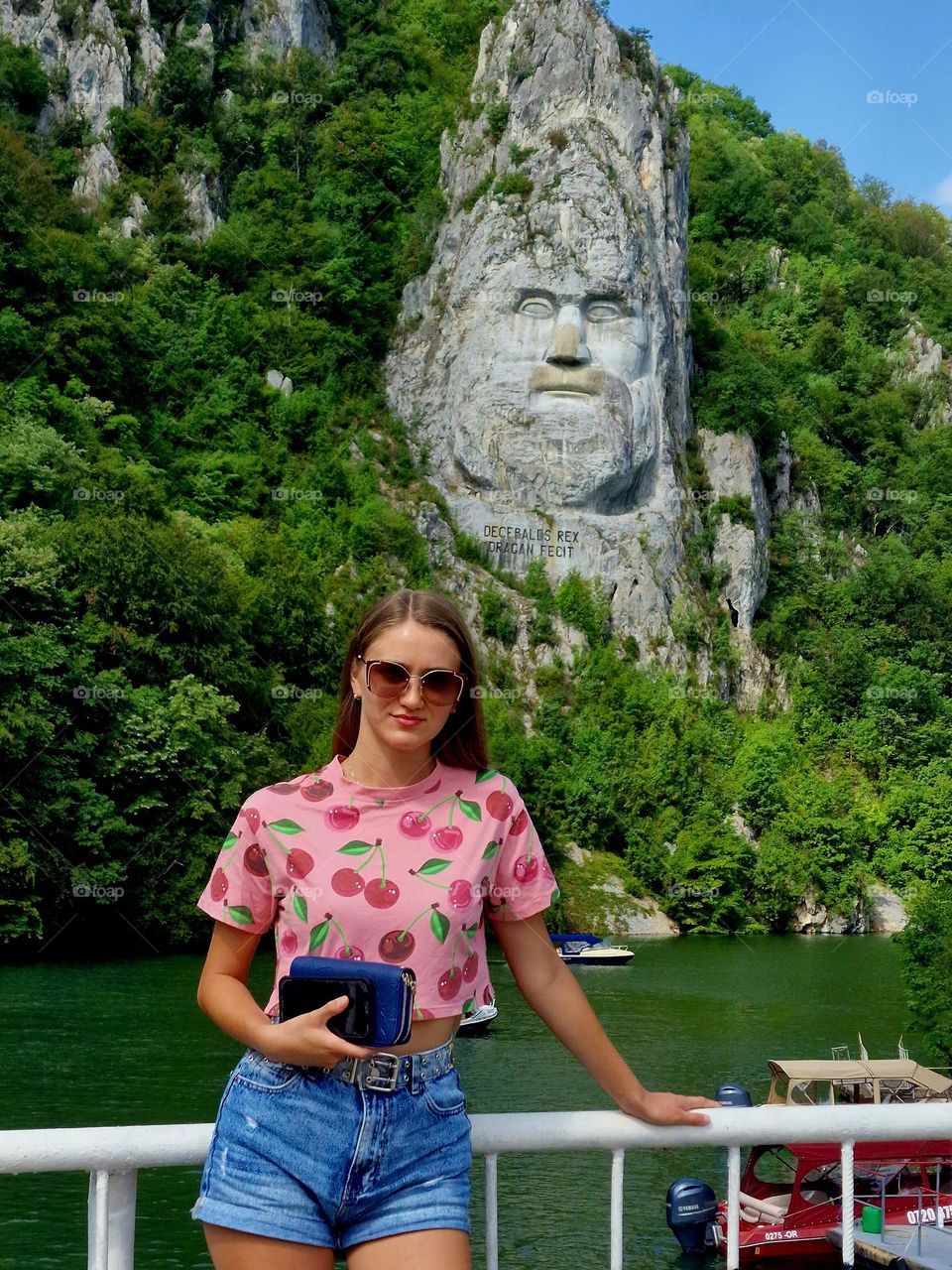 the young girl with the magenta t-shirt with cherries