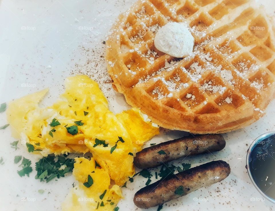 I went to breakfast with a friend. I had an Airy Belgian Waffle, turkey sausage links, and scrambled eggs. It was delicious.