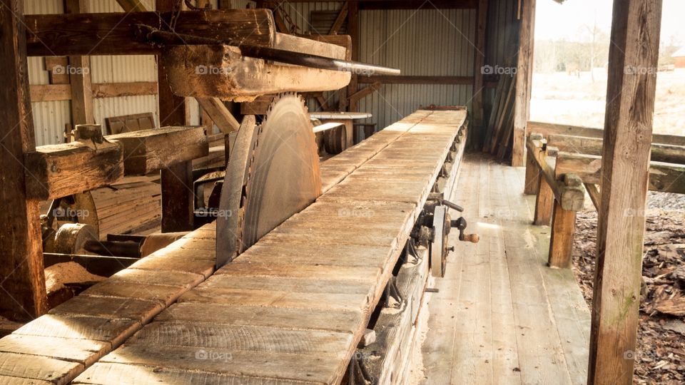 old sawmill in a small Swedish village. this mill is well kept and still used regularly. Sweden is still a big lumber producer but this is not used for industrial purposes