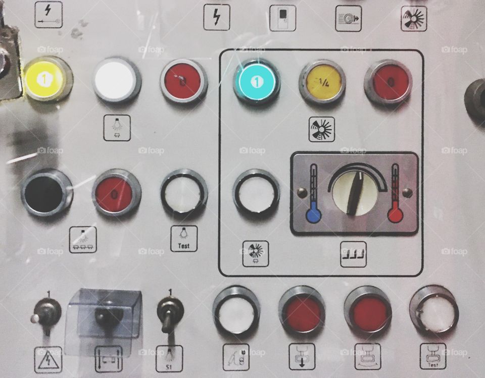 Close up of control panel of train with buttons