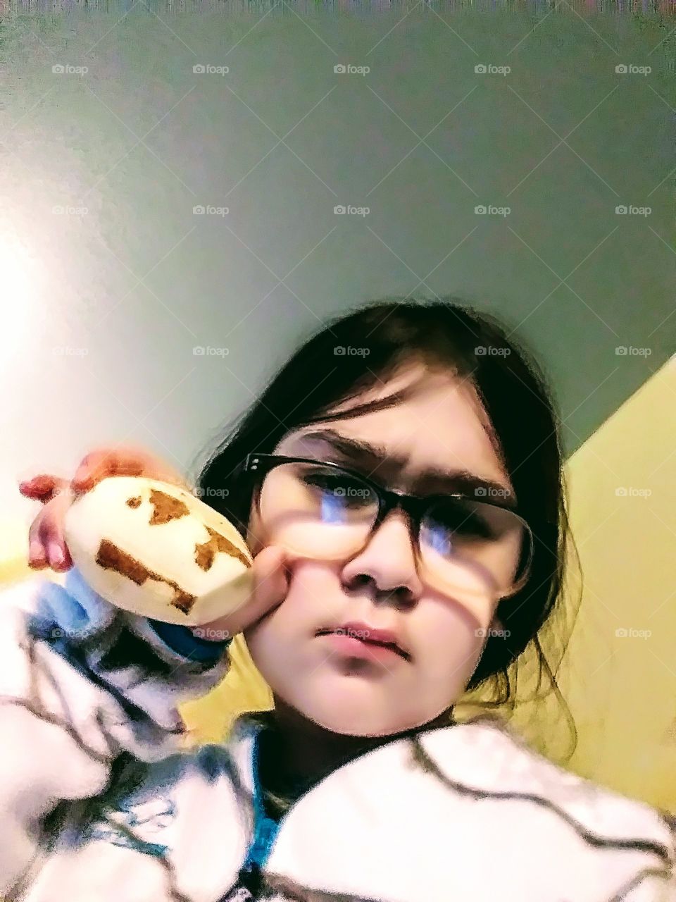 angry potato poses with grumpy kid wearing glasses
