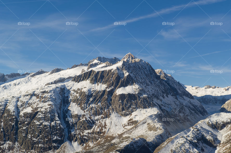 view of a mountain range in the swiss alps 
