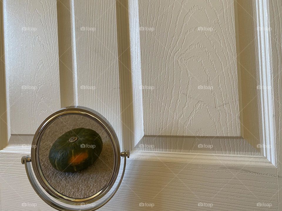 Not ordinary reflection in a mirror 