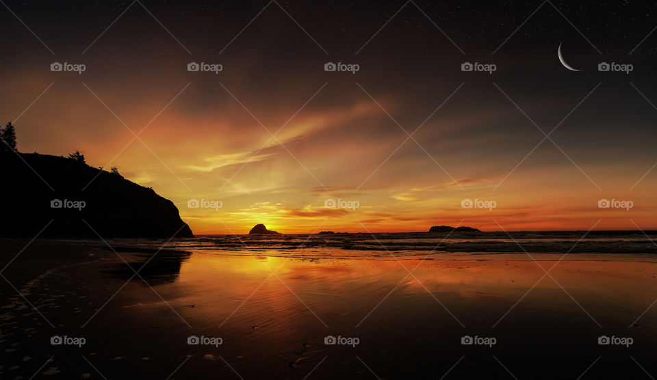 Scenic view of dramatic sky over sea