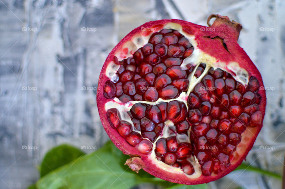 Pomegranate full of vitamins , summer delicious fruit, healthy fruit, summers must eat , childhood, children favourite fruit