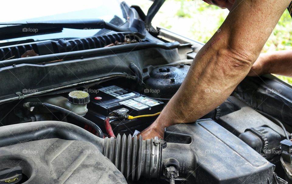 Vehicle maintenance: replacing a car battery at home.