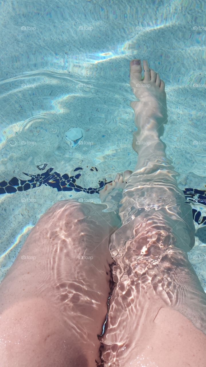 legs in the water