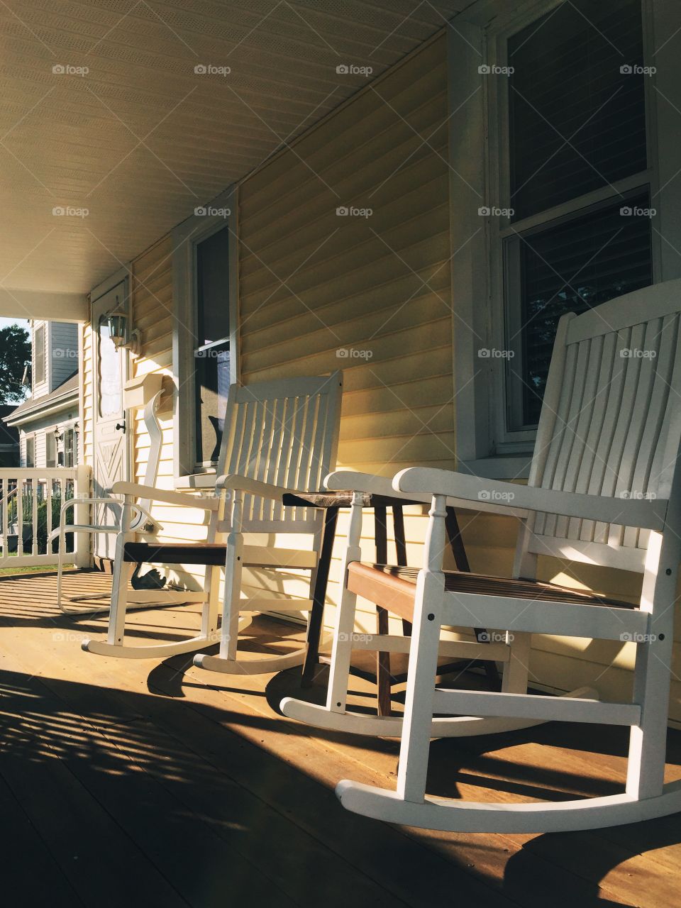 Rocking chairs on a porch 