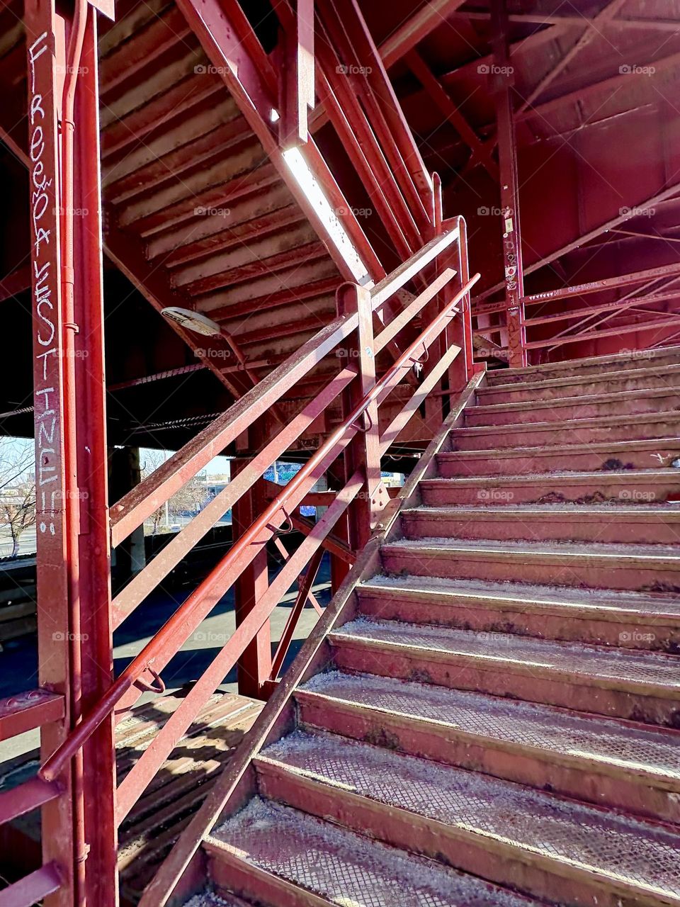 This is the red metal staircase of the “Pulaski Bridge” at “Newtown Creek” on the “Greenpoint”, Brooklyn side. The intricate structures of this marvel of modern architecture show a sheer endless variety of detail. 2023. Hypnotic Productions