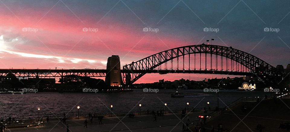The famous Sydney Harbour Bridge. There's a tour that takes you to the top of this bridge. The view of Sydney and beyond is spectacular from there. 