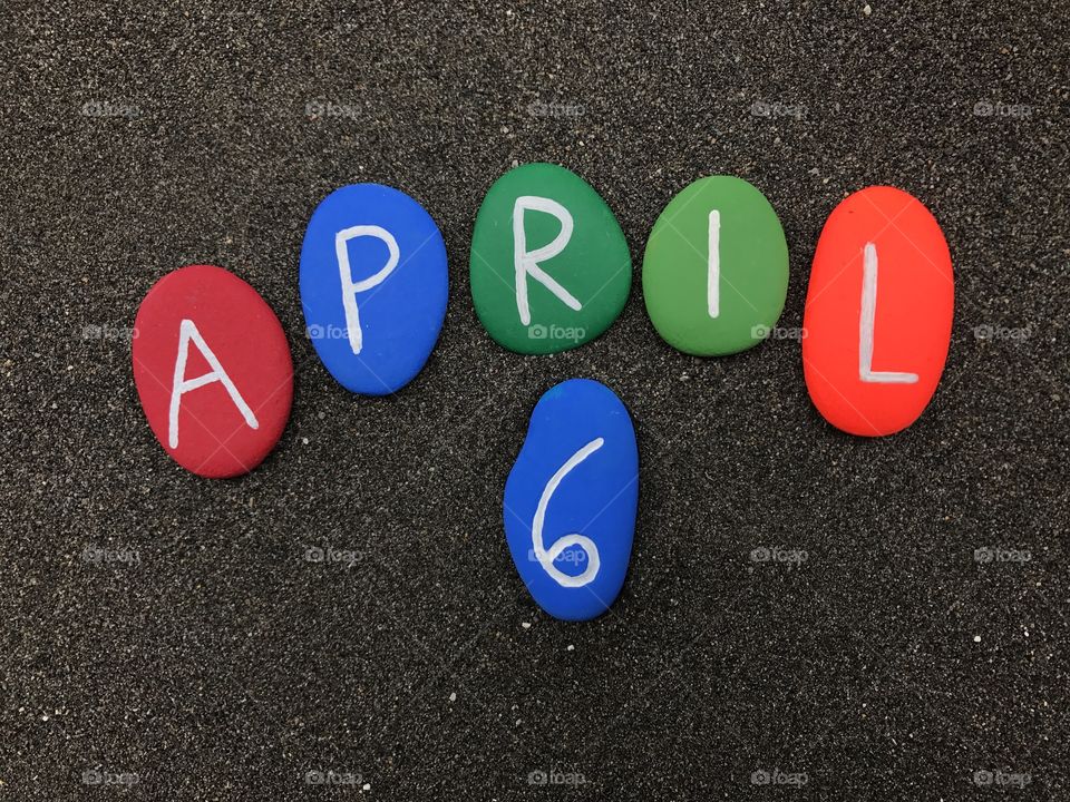 6 April, calendar date with colored stones 