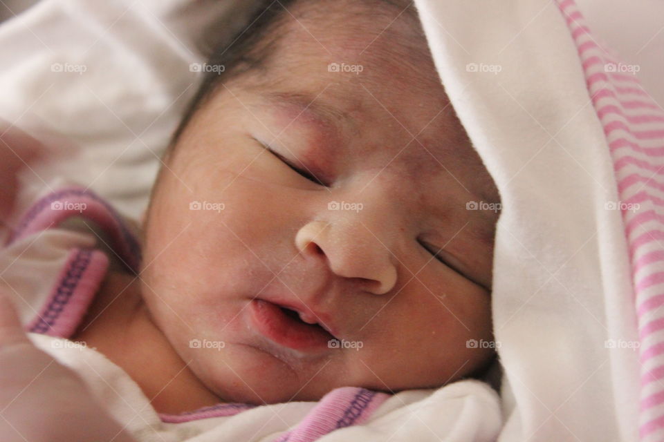 The calmness on the face of the just born is just adorable.
