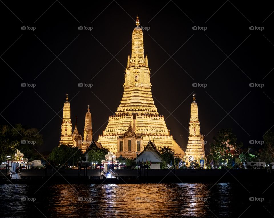 Bangkok/Thailand-The famous Beautiful night scene shot of monastery from Chao Phraya River ,it is wellknown in English as the Temple of Dawn. Once it was generally called Wat Chaeng that means "The Temple of Dawn”