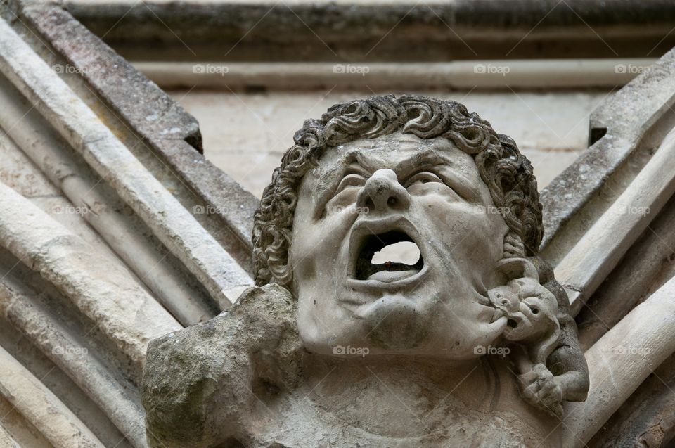Face on a church 
