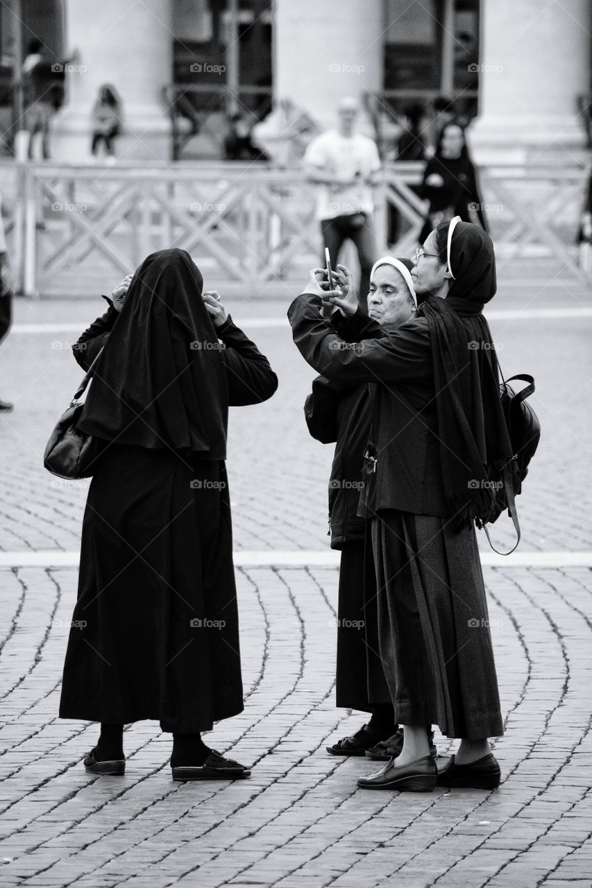 Group of nuns admiring the Vatican  in Rome Italy