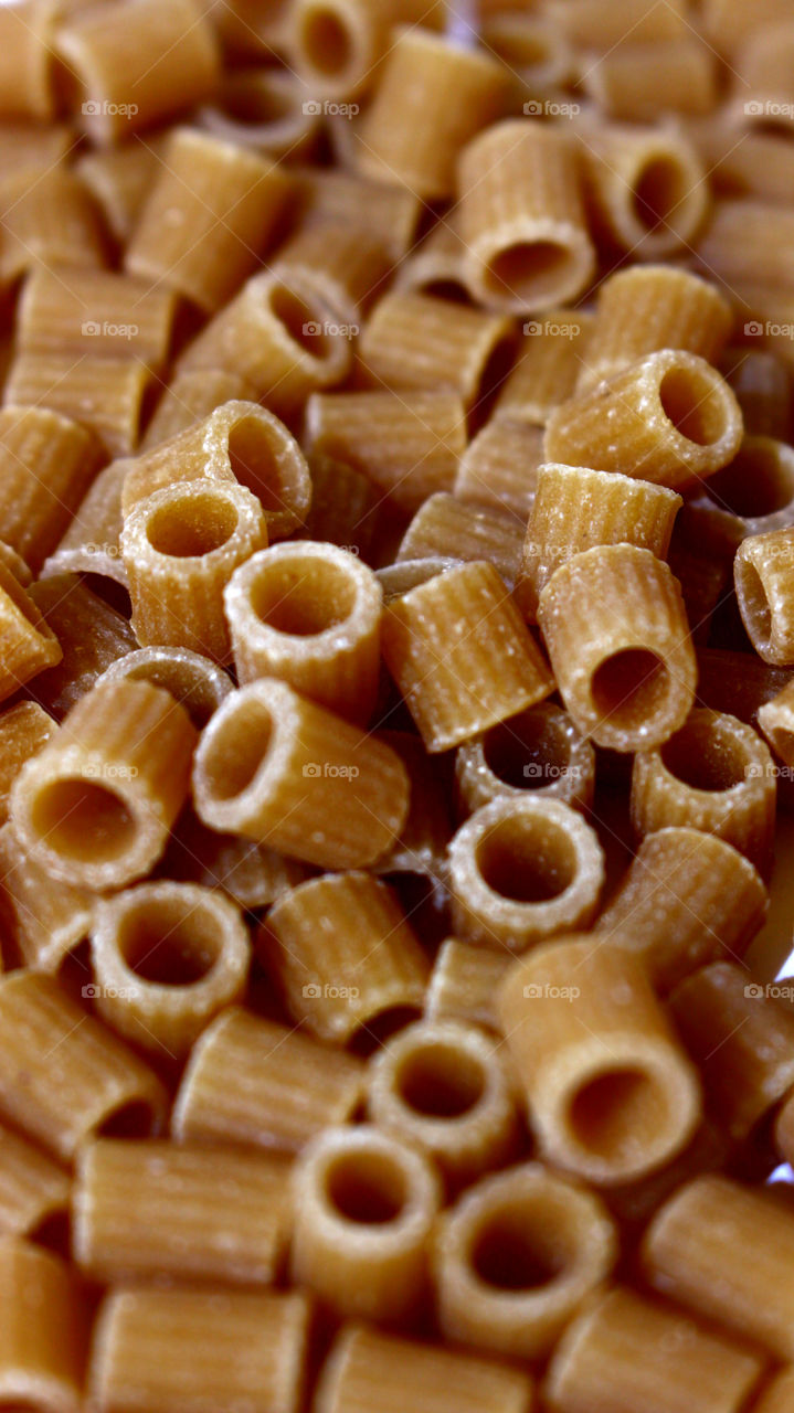 In this photo you can see the Italian bronze and striped Italian pasta. There are different schools of thought on the ribbed pasta and smooth pasta. This is full pasta