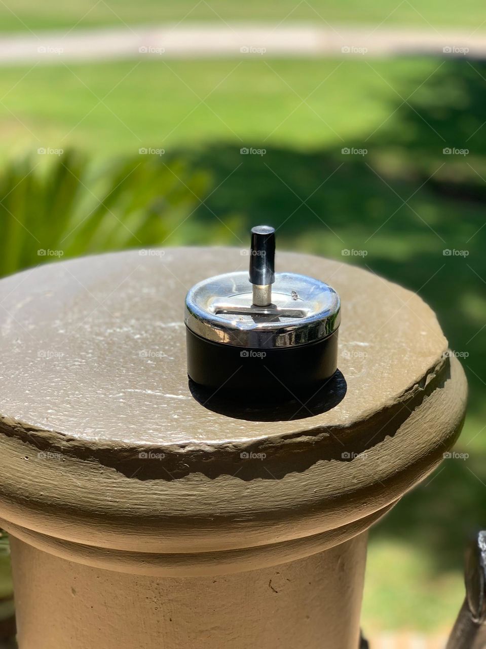 Ashtray on a pillar: pillar, outside, nature, smoking zone