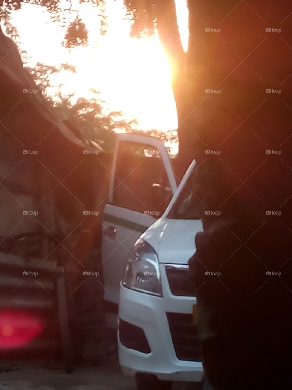 Close-up of white car in sunlight