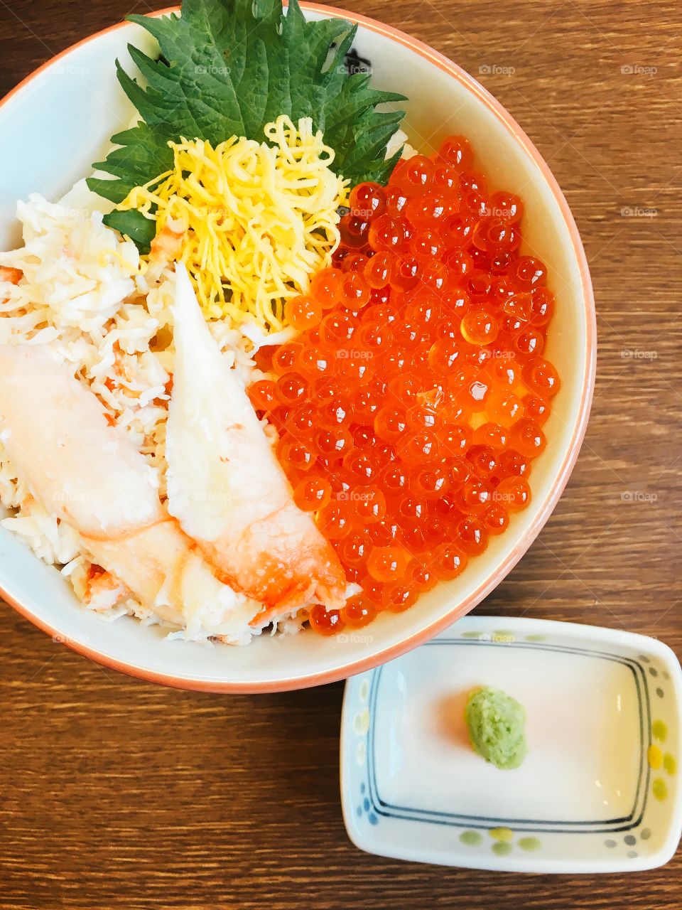Fresh Salmon egg and king crab sushi japanese food with wasabi


