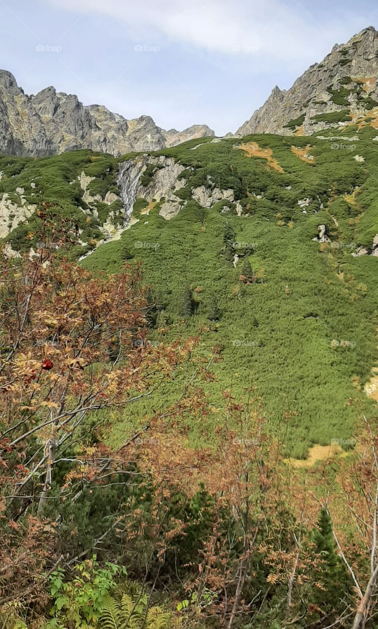 Beautiful Tatra mountains valley with waterfall