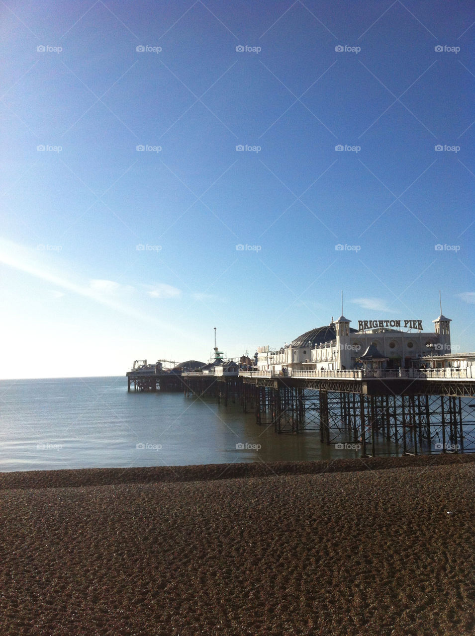 brighton beach sky sun by andyamc
