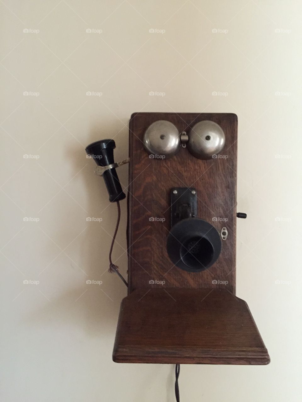 Very old wooden box telephone from the 1930's. 