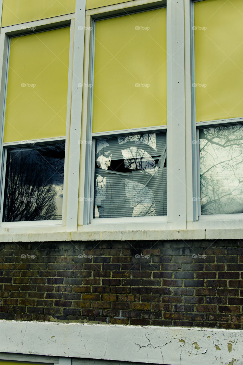 Blinds in disarray at abandoned school