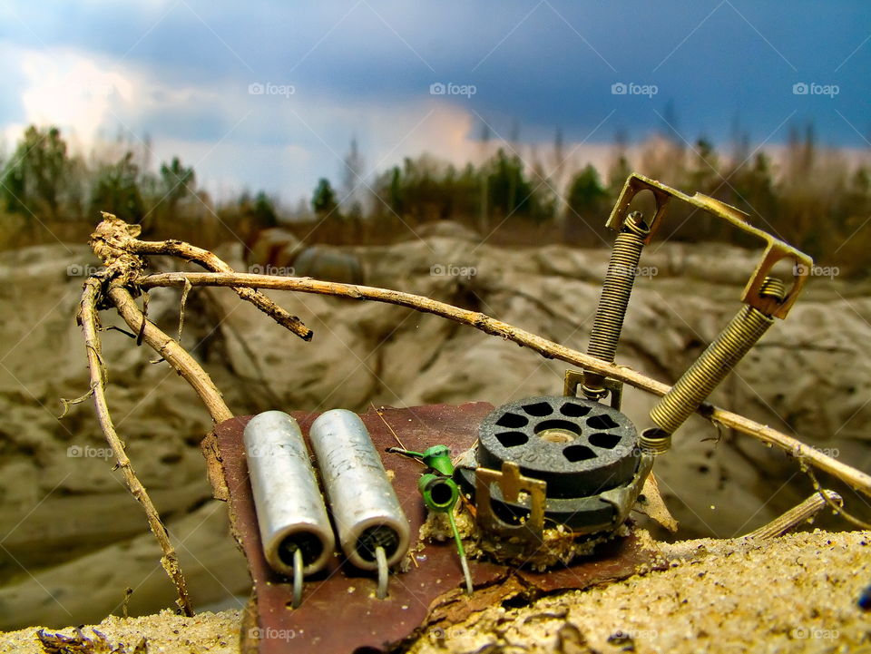 old radio parts among the sands