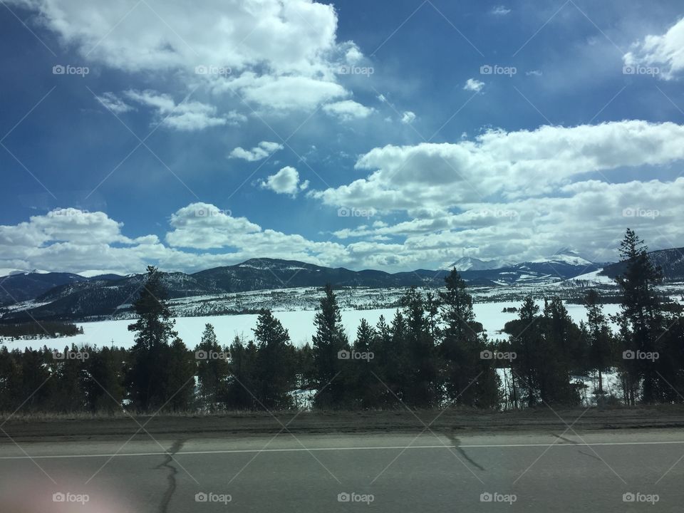 View from highway of snowy icy land