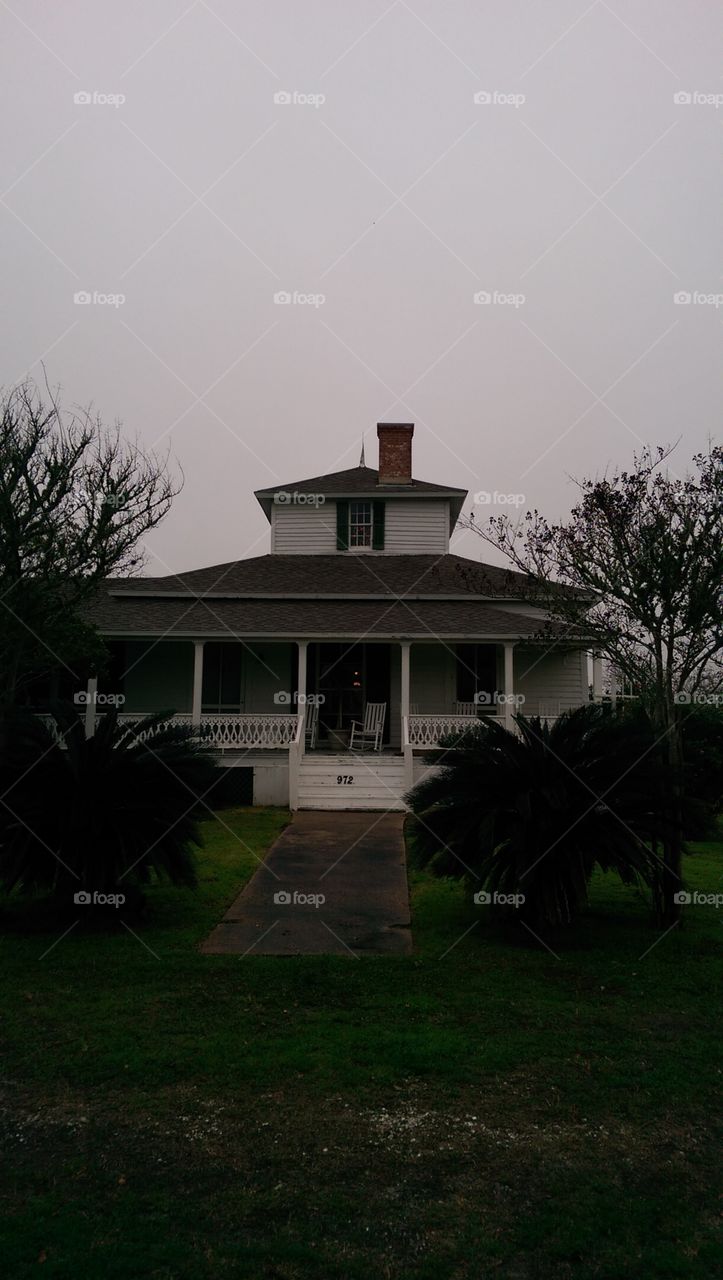 Old house in Matagorda with widows peak on top.