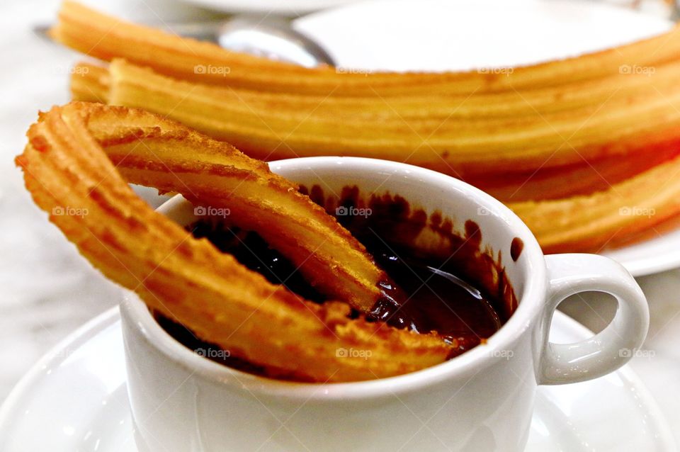 Churro. A churro is a fried-dough pastry—predominantly choux—based snack