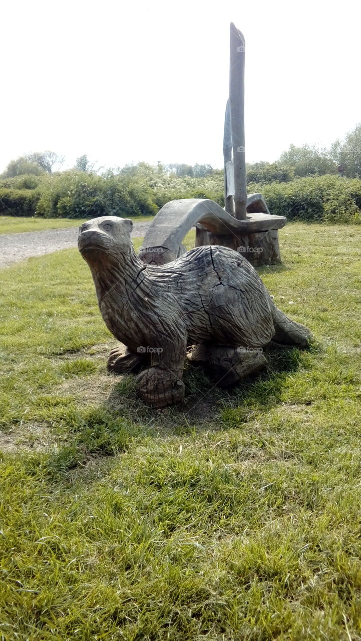 Wooden sculpture of an otter