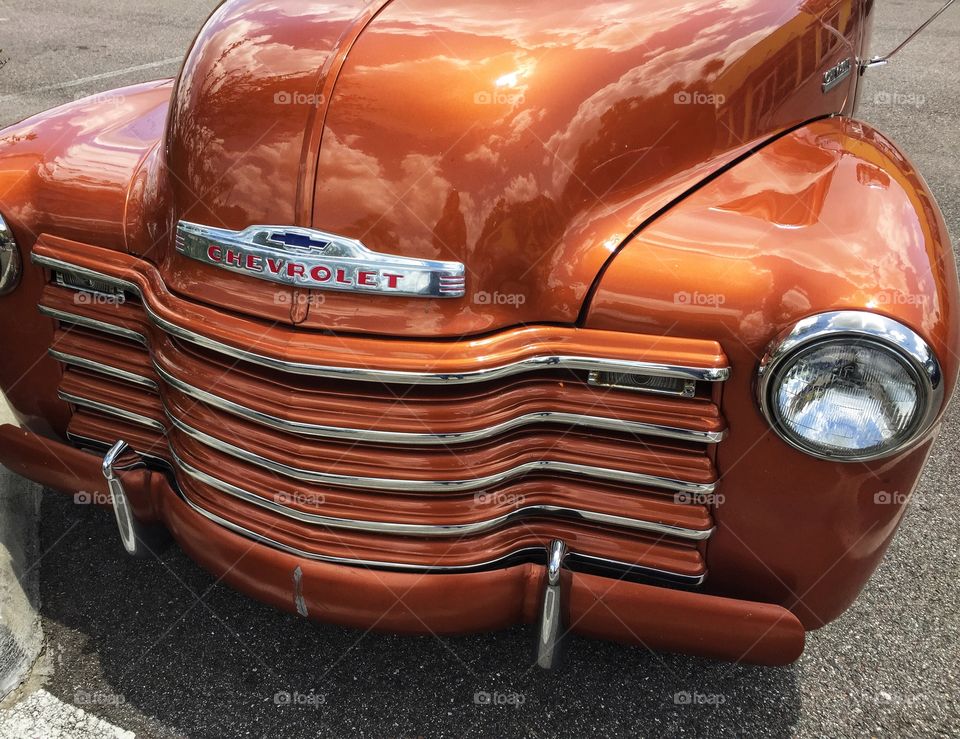 Front end of a restored vintage Chevrolet pickup truck