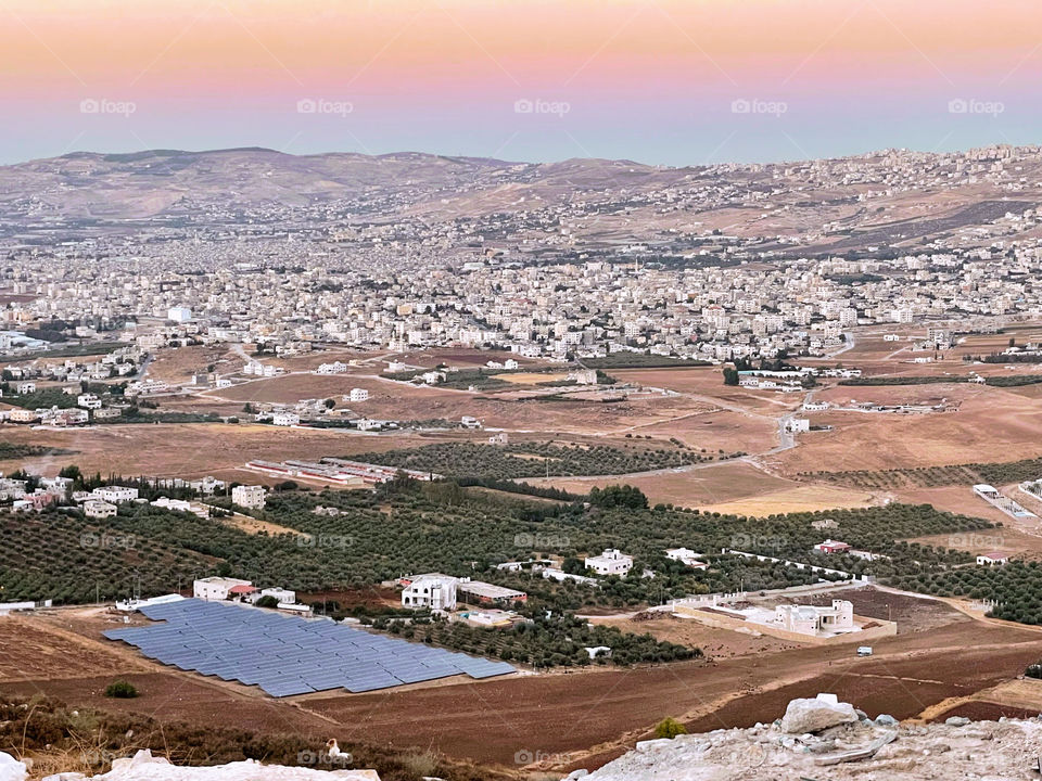 Overlooking small towns from mountaintop Amman Jordan 