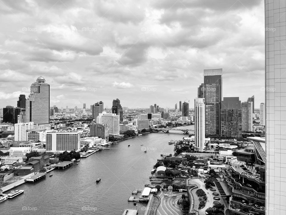 One of metropolis city in the word, Bangkok, Thailand. Representative new life style along Chao Phraya River that there is less of local community but business and hotels building rising.